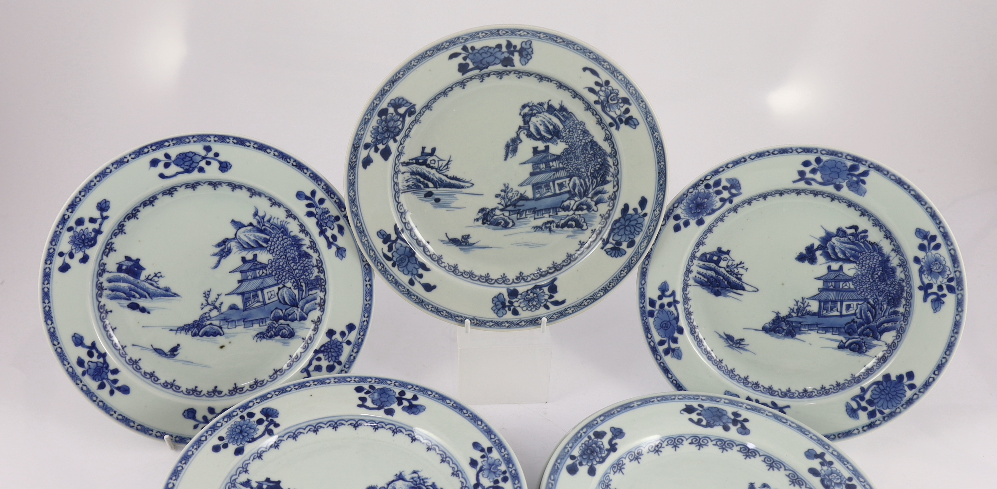 Twelve Chinese blue and white ‘Boatman and Six flower border’ plates, Nanking Cargo, c.1750